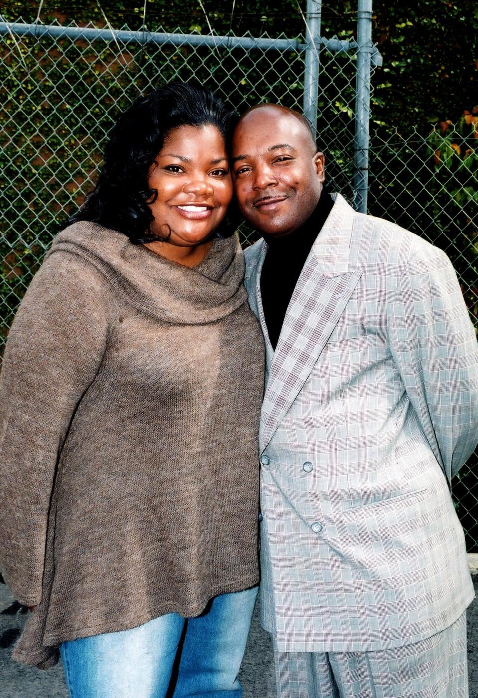 Comedienne and actress Mo'Nique (Monique Angela Hicks) poses for photos with her husband Sidney Hicks after participating in a panel discussion in Atlanta, Georgia in February 2004.