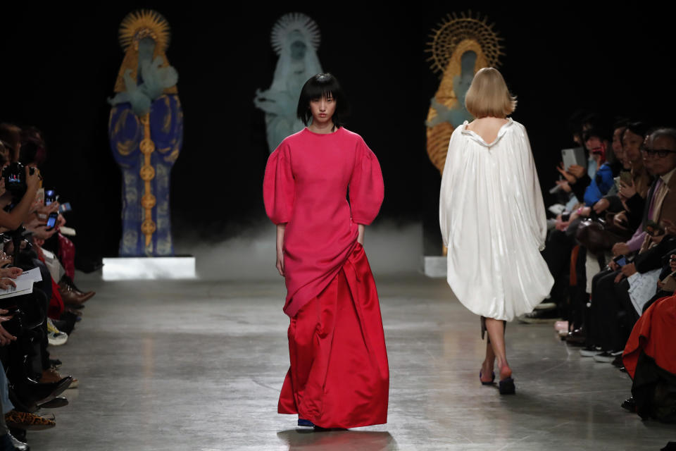 Models wear creations for Junko Shimada fashion collection during Women's fashion week Fall/Winter 2020/21 presented in Paris, Tuesday, March 3, 2020. (AP Photo/Francois Mori)