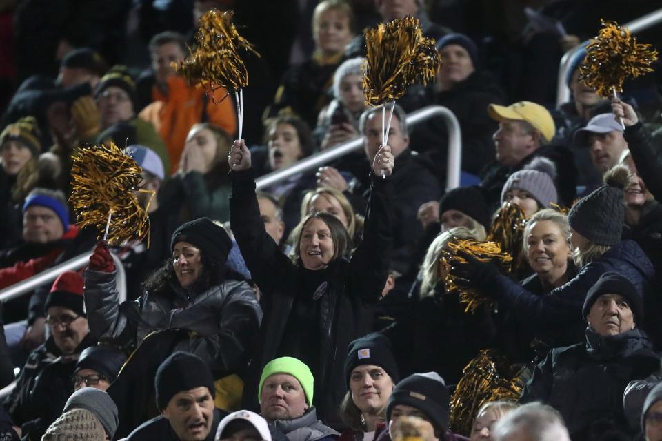 Upper Arlington fans cheer on the Golden Bears during their Division I OHSAA Football Regional Semifinal game against New Albany on Nov. 12, 2021, at Olentangy Liberty High School in Powell, Ohio.