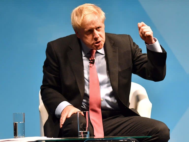 Boris Johnson was taken to task by the BBC’s Andrew Neil over his knowledge of GA​TT 24 – the clause in WTO rules he believes could allow the UK to continue to trade freely with the EU in a no deal scenario.In a heated debate between the veteran presenter and the prospective Prime Minister aired on Friday, Mr Johnson said: “It might be possible, and I accept this has to be done by mutual agreement, but it might be possible for instance as we come out to agree under GATT 24 paragraph 5b that both sides agree to a standstill, a protraction of their existing zero tariff, zero quota arrangements until such time as we do a free trade deal. That would be one way forward and I think that would be very attractive.”However he struggled when asked by Mr Neil “how would you handle paragraph 5c” – initially saying he would “confide entirely in paragraph 5b” before admitting he did not know what was in paragraph 5c.And, when the importance of the clause was put to him, the man most likely to become the UK’s next prime minister deflected the question – instead asking “Why this defeatism? Why this negativity? Why can’t we rely on the goodwill and the common sense of these parties to get this done?” What is GATT 24?The General Agreement on Tariffs and Trade, better known as GATT, was an agreement on the rules of world trade between states including the UK in 1948, and established the rules countries should trade under when it comes to goods. It was this general agreement the World Trade Organisation grew out of 50 years later, and the regulatory body still holds onto the rules established in it.Some backing the plan to drop out of the EU with no-deal have said GATT’s article 24 will allow the UK and the EU to continue to trade without tariffs as they do now – however it is not as simple as dropping out of the union and into a free trade agreement. What is paragraph 5b?Paragraph 5b, quoted by Mr Johnson as a way to “agree to a standstill” is a rule that allows a new temporary free trade area to be made between two countries, as long as it does not unfairly damage trade in other countries outside of the deal.As the UK and EU already have a deal, the wording of the agreement means the UK could continue to trade as it does currently. However the rule only applies to goods – and not to services, which made up 40 per cent of the UK’s exports into the EU in 2017.It would also depend on the ability of the UK to get the EU to agree to move to the free trade agreement – a potentially difficult step given the union’s commitment to stick to the deal negotiated by Theresa May before her resignation.On top of this, if the UK drops out from trading with the EU even briefly, WTO members could argue that a new deal would harm the nature of their trade with either side, fully closing the door on an interim agreement between Britain and Brussels. What is paragraph 5c?Despite his response to Andrew Neil, Boris Johnson can not “confide entirely in paragraph 5b”. While the paragraph allows a potential get-out, the countries behind the rules put a clause in to make sure stop-gap trade agreements do not run on forever.The rules under 5c say that any interim agreement must “include a plan and a schedule” for the formation of a full free trade area “within a reasonable length of time”.That length of time has been agreed by WTO members to mean less than 10 years – which means Mr Johnson must negotiate a clear idea of what the eventual relationship between the UK and the EU will look like in the next decade before dropping out into a no deal scenario if GATT 24 is going to help the UK continue to trade.The schedule meanwhile will tie the UK to a formal date ending the interim agreement, leaving the nation compelled into a ‘Canada’ style deal which must also be agreed with the EU. Can GATT 24 work?While the plan has approval among some pro-Brexit MPs, it has so far been deemed the wrong step by parliament, and has been challenged by the chief of the WTO.The House of Commons voted down the plan by 164 votes to 374 when it was put forward as the Malthouse Compromise by conservative MP Kit Malthouse.While earlier this week WTO director General Roberto Azevedo told Prospect Magazine “If there is no agreement” on what the future plan would be “then Article 24 would not apply, and the standard WTO terms would”.