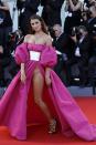 <p>The Italian model started a trend known as the ‘vagina dress’ after flaunting her wares at the Venice Film Festival. <i>[Photo: Getty]</i> </p>