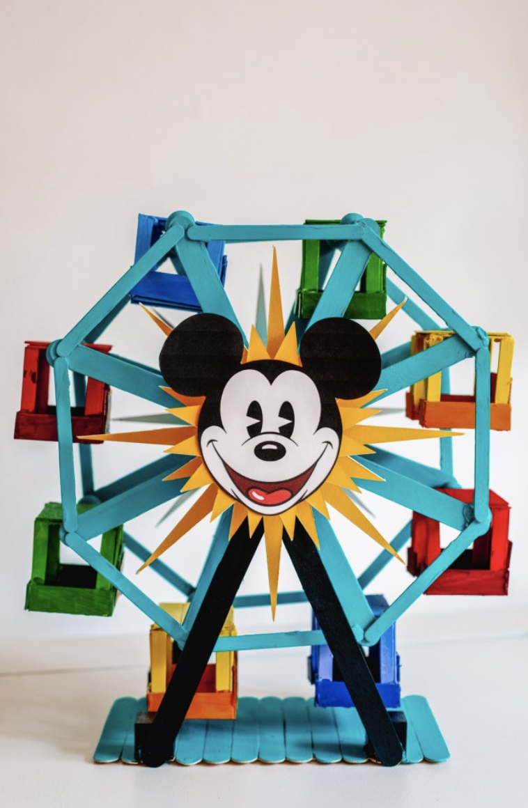 crafts for kids, ferris wheel made of colorful craft sticks, with a mickey mouse sticker in the center