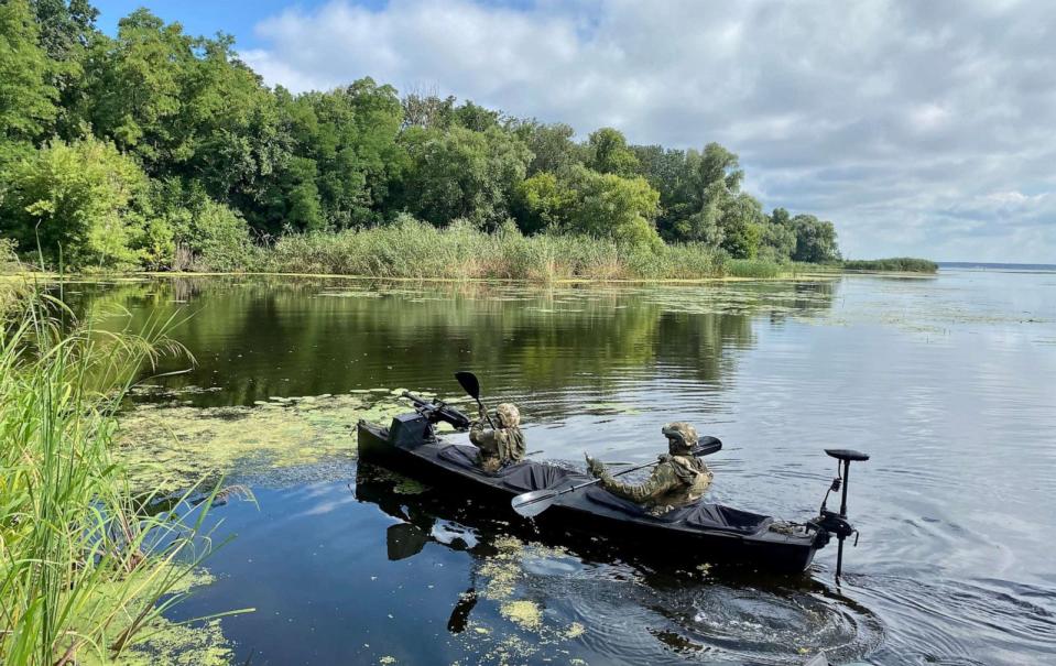 PHOTO: Two unidentified Ukrainian soldiers test the Poloz-M16 combat kayak. (Courtesy of Adamant Verf)