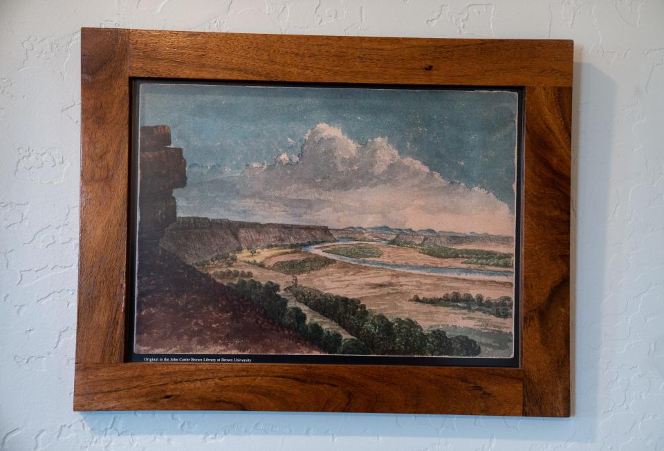 “View on the Gila River, Arizona” by John Russell Bartlett, 1852, hangs on the wall, Feb. 20, 2023, in a home on the Oatman Flats Ranch in Dateland, Ariz.