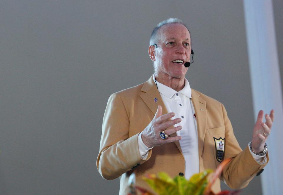 Jim Kelly, a former University of Miami and Pro Football Hall of Fame quarterback, speaks at the 20th annual Vero Beach Prayer Breakfast, Thursday, Feb. 15, 2024, at Riverside Park. Jim spoke about the power of fours; faith, friends, family and fans and shared his journey of perseverance to the thousands of people who attended.