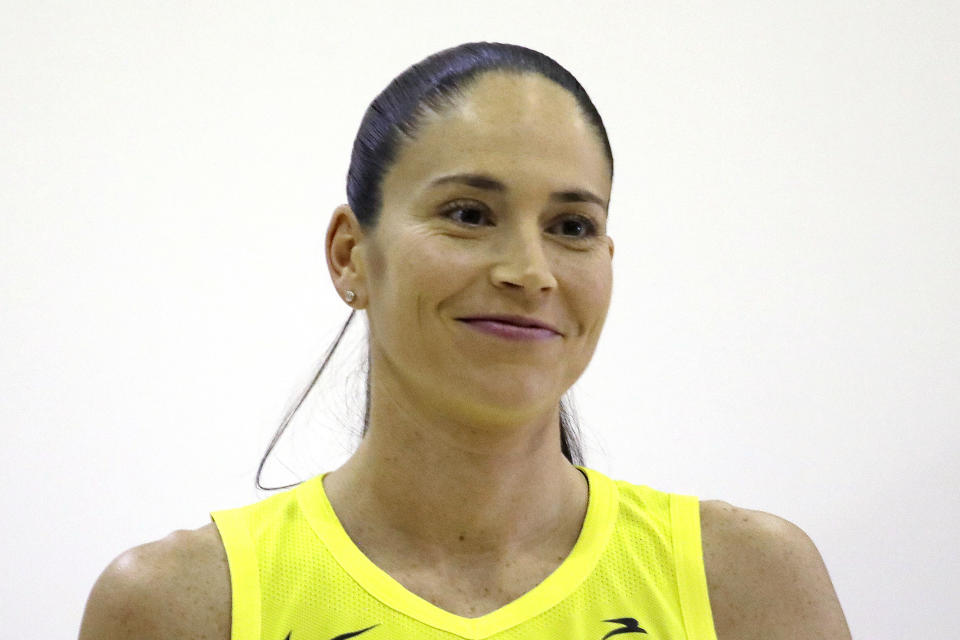 FILE - This May 13, 2019, file photo shows Seattle Storm's Sue Bird posed for a photo at the basketball team's media day in Seattle. Seahawks quarterback Russell Wilson, soccer star Megan Rapinoe and three-time WNBA champion Sue Bird will preside over The ESPYS two-hour broadcast airing June 21 on ESPN. All three live in the Seattle area. Rapinoe and Bird are partners who share a household, which conveniently eases some logistics. Wilson’s singer-wife, Ciara, is likely to make an appearance, too. (AP Photo/Elaine Thompson, FIle)