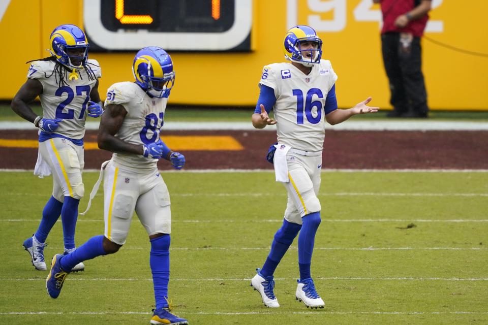 Los Angeles Rams' Jared Goff reacts after his touchdown run during the first half of an NFL football game against the Washington Football Team Sunday, Oct. 11, 2020, in Landover, Md. (AP Photo/Susan Walsh)
