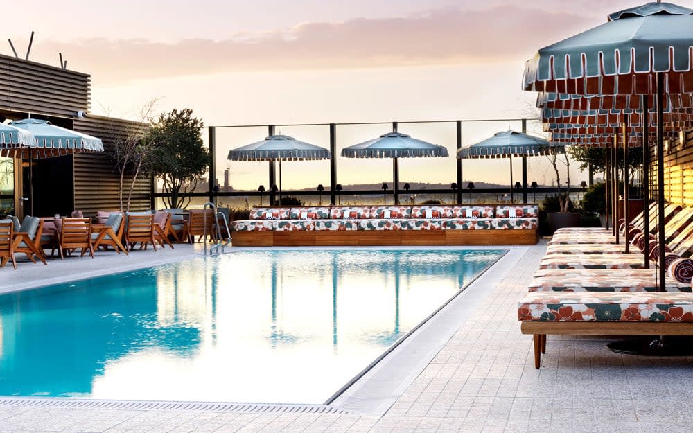 Sprawl around the rooftop pool and watch the sun sink into the sea at Soho House Mumbai 