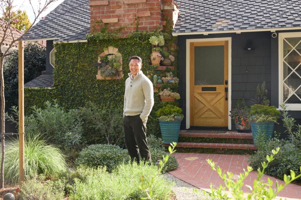 FormLA lead designer Isara Ongwiseth poses in the front yard he designed.