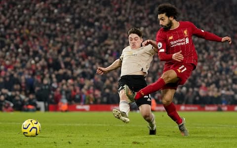 Salah slides home Liverpool's second - Credit: AP