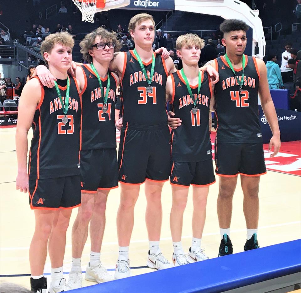 Anderson seniors, from left, Nick Engel, Trevor Platton, Charlie Thon, Ethan Hensley and Chandler Starks after the Raptors' district final loss to Centerville March 4, 2023 at University of Dayton Arenal