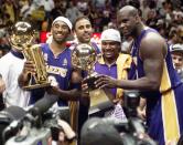 Bryant and teammate Shaquille O'Neal — who often had a contentious relationship — helped lead the Lakers to three consecutive NBA Championships from 2000 to 2002. 