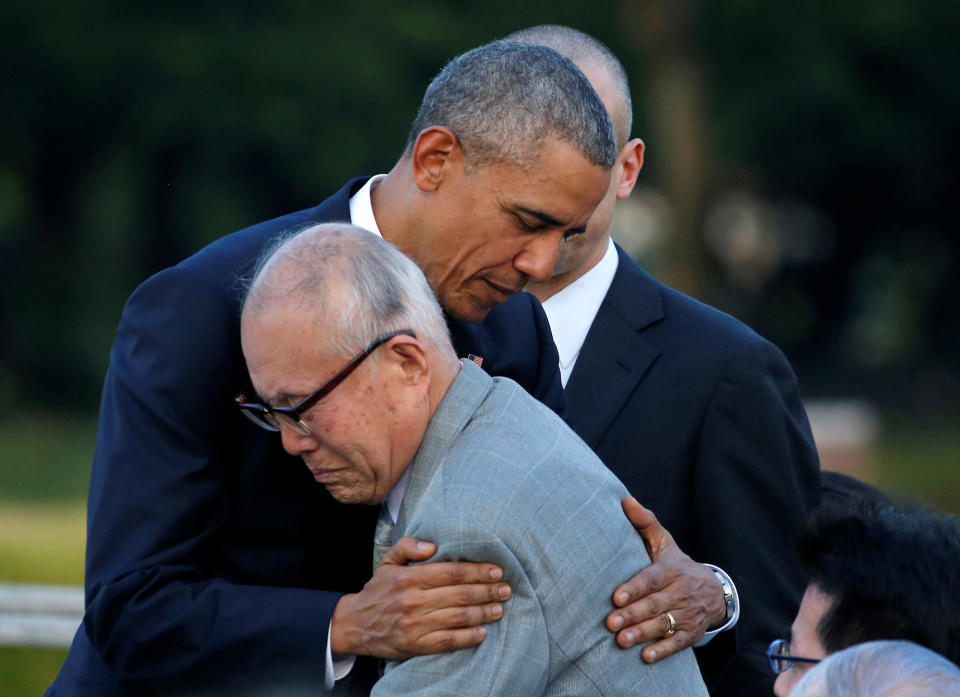 <p>President Barack Obama hugs with atomic bomb survivor Shigeaki Mori as he visits Hiroshima Peace Memorial Park in Hiroshima, Japan May 27, 2016. (Photo: Carlos Barria/Reuters) </p>