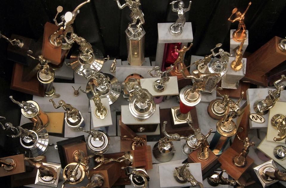 A bin full of June Wurden's trophies at her home near Brownsville.