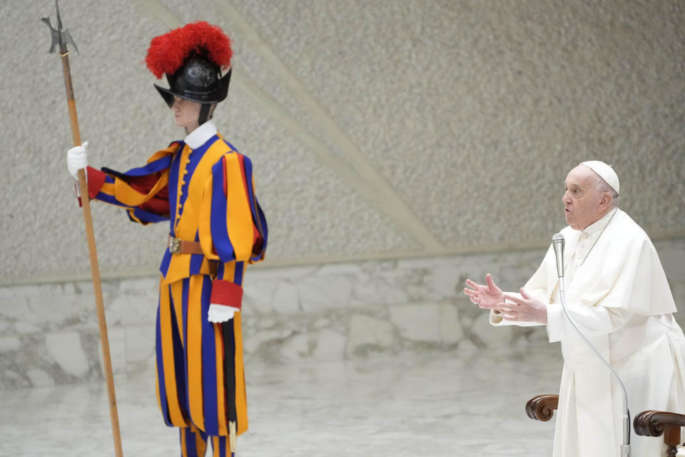 Pope Francis greets faithful during the weekly general audience at the Vatican, Wednesday, March 27, 2024. (AP Photo/Gregorio Borgia)