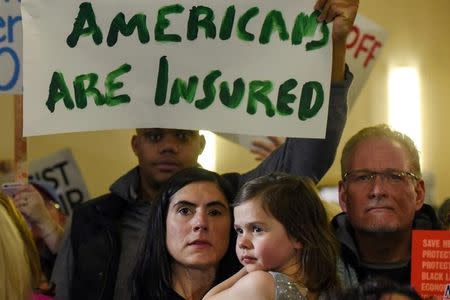 FILE PHOTO: People demonstrate for the Affordable Care Act and against Trump during the First Stand Rally in Newark, N.J., U.S. January 15, 2017. REUTERS/Stephanie Keith