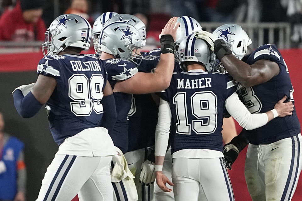 Dallas Cowboys place kicker Brett Maher (19) is congratulated after his extra point against the Tampa Bay Buccaneers during the second half of an NFL wild-card football game, Monday, Jan. 16, 2023, in Tampa, Fla. (AP Photo/Chris Carlson)
