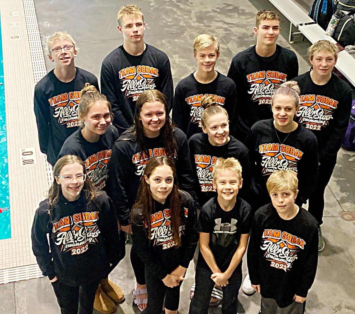 These 13 Watertown Area Swim Club swimmers were chosen to represent South Dakota recently in the Midwest All-Stars Meet at Des Moines, Iowa. The honored Dolphins include from left in front, Josephine Waite, Joanie Makens, Nolan Boettcher and Clayton Muller; middle row, Elsie Boetcher, Leila Byer, Roslyn Waite and Kyleigh Hansen; and back, Parker Hoftiezer, Jason Kasparek, Owen Muller, Haydn McGillivary and Kooper Heiser.