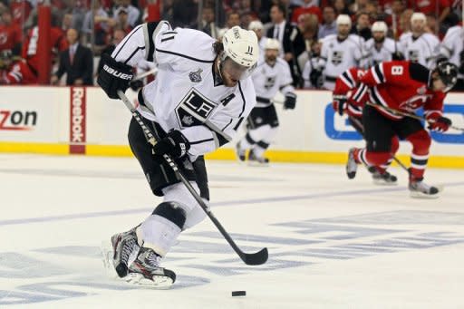 Los Angeles Kings' Anze Kopitar skate the puck up the ice before scoring the game-winning goal during overtime on May 30. The Kings downed the Devils 2-1 in the opening game of the NHL championship Stanley Cup Finals