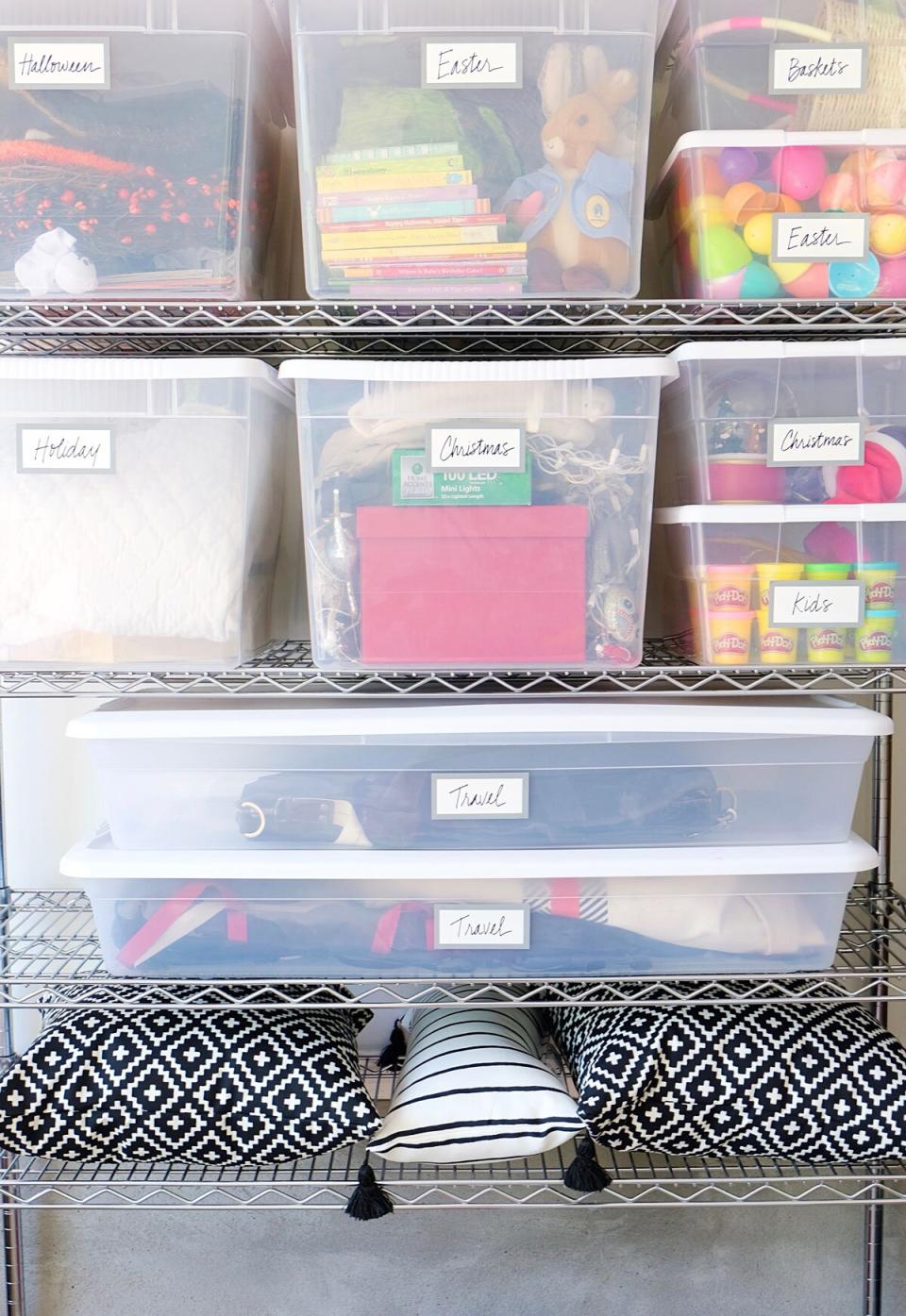 Labeled Plastic Bins Holding Seasonal Household Items Stacked on Shelves