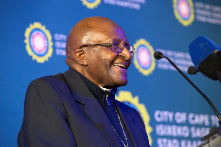 Quick to crack jokes, Tutu was always ready to dance and laugh uproariously with an infectious cackle (AFP/RODGER BOSCH)