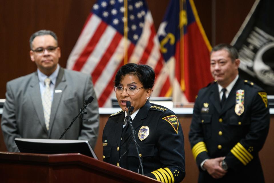 Chief Gina V. Hawkins, center, talks to the media after Assistant Chief Kemberle Braden, right, was named as her replacement as Fayetteville Police Chief during a press conference at city hall on Wednesday, Dec. 28, 2022. Hawkins left the department in February of 2023. In December, the city settled accusations she made against Mayor Mitch Colvin and other city officials over what she called a hostile work environment.