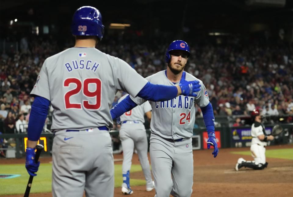 Chicago Cubs Cody Bellinger (24) celebrates hitting a home run against the Arizona Diamondbacks in the sixth inning at Chase Field in Phoenix on April 17, 2024.