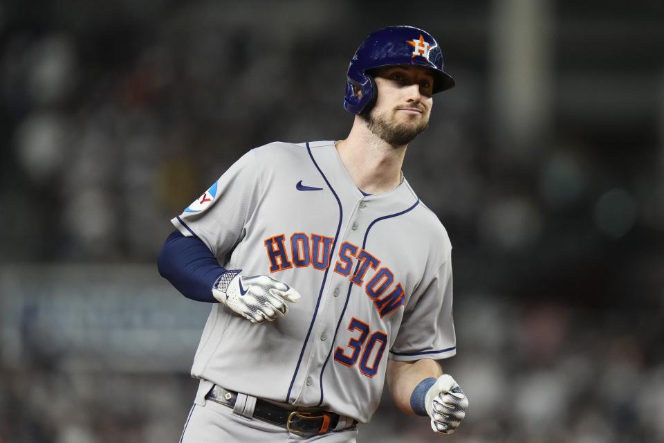 Houston Astros' Kyle Tucker smiles as he runs the bases after hitting a home run during the sixth inning of a baseball game against the New York Yankees, Thursday, Aug. 3, 2023, in New York. (AP Photo/Frank Franklin II)