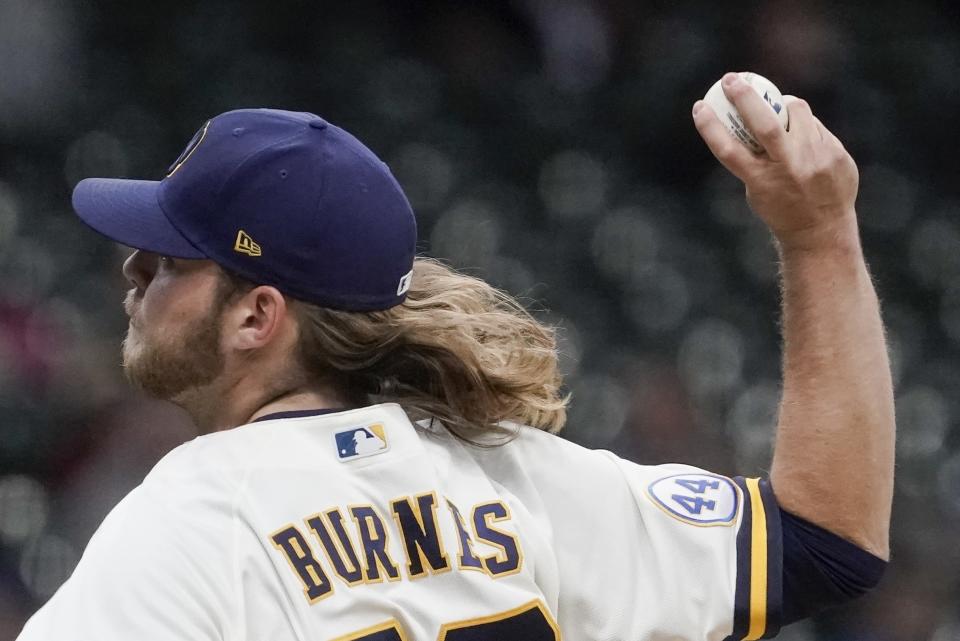 Milwaukee Brewers starting pitcher Corbin Burnes throws during the first inning of a baseball game against the Chicago Cubs Wednesday, April 14, 2021, in Milwaukee. (AP Photo/Morry Gash)