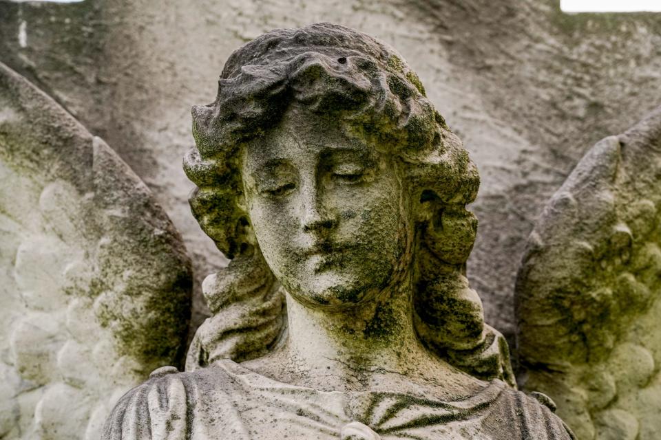 A monument often referred to as the Walls angel is a favorite of Marty Davis on Friday, August 12, 2022, at Crown Hill Funeral Home and Cemetery in Indianapolis. Davis, who recently retired from the cemetery after 40 years, will receive a butterfly garden in her name installed near the entrance to Crown Hill.