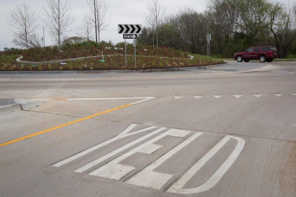 The modern roundabout allows vehicles to yield and make a smoother speed change. Roundabout is opened at the intersection of Russell and Calender Roads in Arlington on Friday, March 18, 2016.