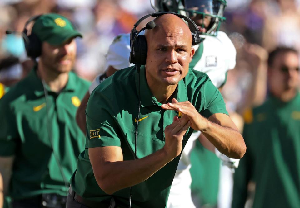 Baylor Bears head football coach Dave Aranda calls a timeout during a game against TCU at Amon G. Carter Stadium in Fort Worth.