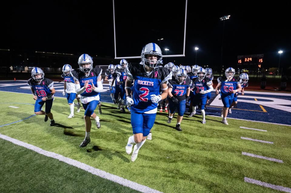 Auburn High takes the field versus Swampscott during the continuation of a game from Week 1, that was suspended by lightning, on Tuesday October 17, 2023.