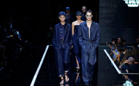 Hers and His boiler suits at Emporio Armani SS19 - Credit: Getty Images Europe. /Estrop. 