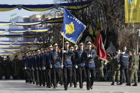 Members of Kosovo Security Forces (KSF) march during a celebration marking the eighth anniversary of Kosovo's declaration of independence from Serbia, in Pristina February 17, 2016. REUTERS/Marko Djurica/Files