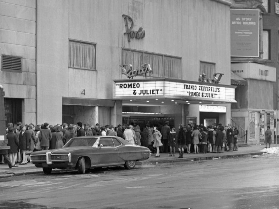 Large crowds of people gather outside the Paris Movie Theater on 58th Street in Manhattan to see Franco Zeffirelli's "Romeo and Juliet" in 1969