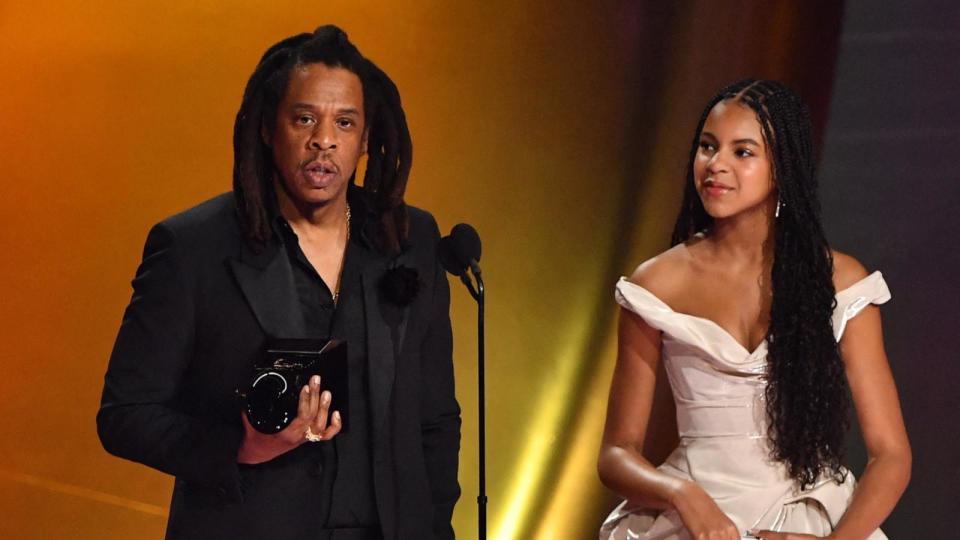 PHOTO: Jay-Z accepts the Dr. Dre Global Impact Award alongside his daughter Blue Ivy during the 66th Annual Grammy Awards, Feb. 4, 2024.  (Valerie Macon/AFP via Getty Images)