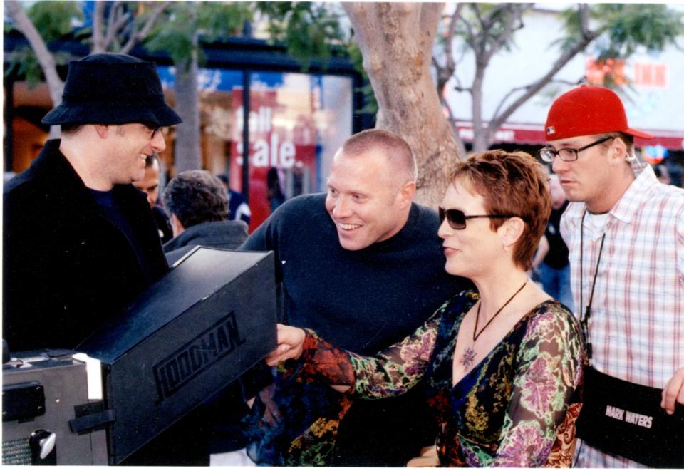 From left, OG Freaky Friday director Mark Waters, producer Andrew Gunn, and Jamie Lee Curtis, on set in 2003.