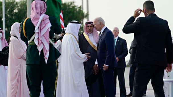 PHOTO: President Joe Biden is greeted by Saudi Arabia officials as he arrives at King Abdulaziz International Airport, July 15, 2022, in Jeddah, Saudi Arabia. (Evan Vucci/AP)