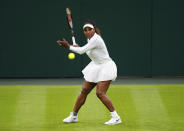 Serena Williams practices on Centre Court ahead of the 2022 Wimbledon Championship at the All England Lawn Tennis and Croquet Club, in London, Friday June 24, 2022. (Adam Davy/PA via AP)