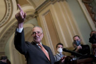 Senate Majority Leader Chuck Schumer, D-N.Y., takes questions as he speaks to reporters after a weekly policy meeting, at the Capitol in Washington, Tuesday, Sept. 21, 2021. (AP Photo/J. Scott Applewhite)