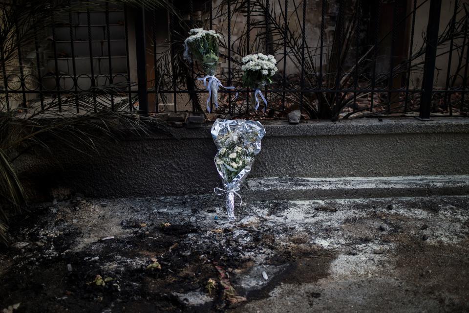 <p>Girogos Handrinos stands outside his burned house in Mati, east of Athens, Thursday, July 26, 2018. (Photo: Thanassis Stavrakis/AP) </p>
