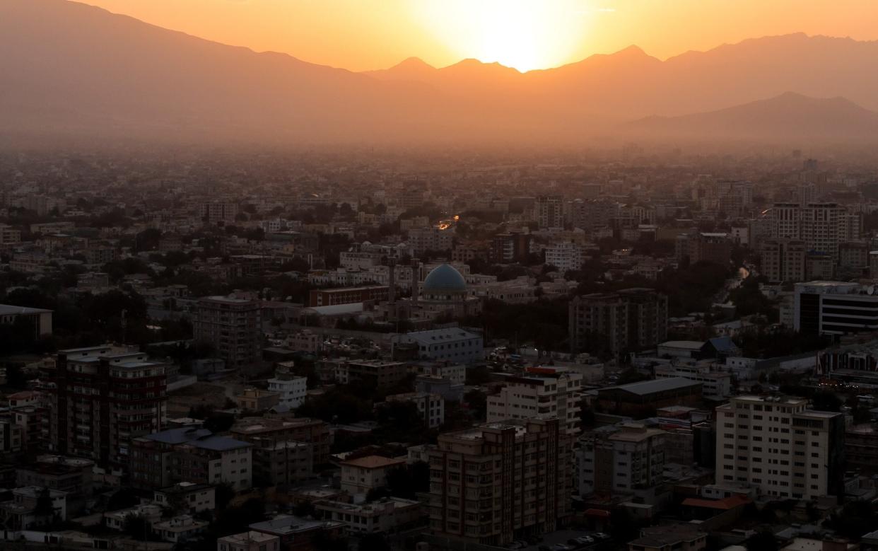 The sun sets over Kabul, Afghanistan - REUTERS