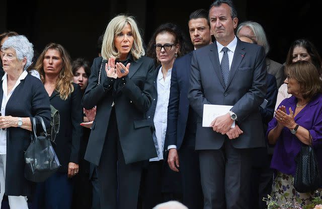 <p>Sipa via AP Images</p> Brigitte Macron was among the mourners.