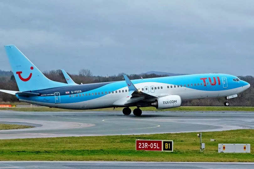 A stock image of a TUI plane at Manchester Airport