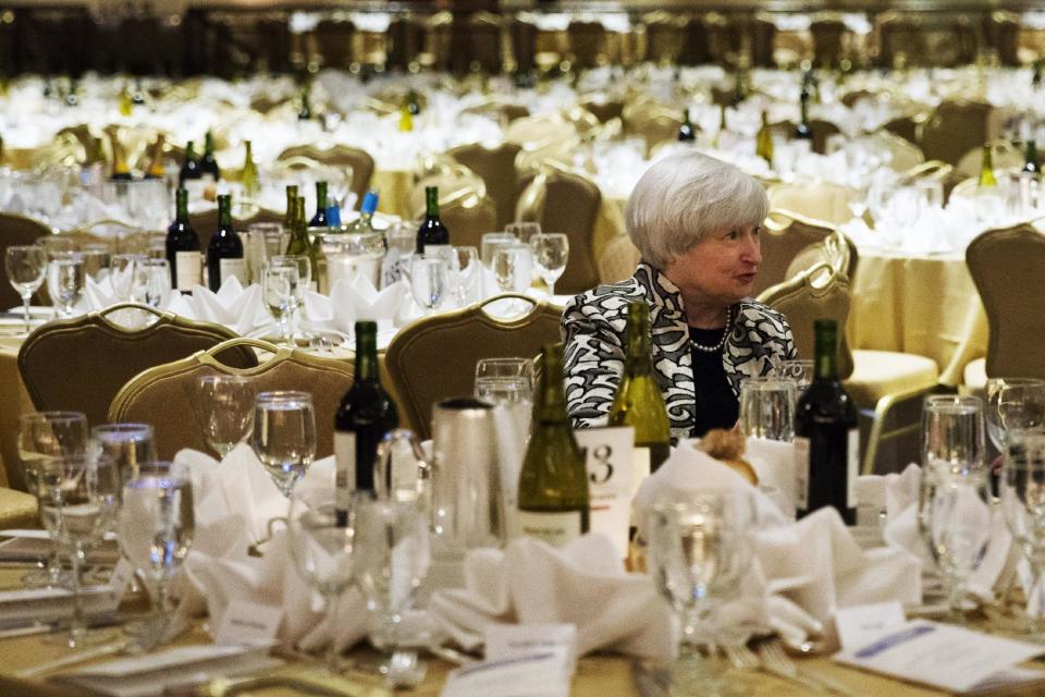 Federal Reserve Chairwoman Janet Yellen sits at a table before the start of the White House Correspondents' Association (WHCA) Dinner at the Washington Hilton Hotel, Saturday, May 3, 2014, in Washington. (AP Photo/Jacquelyn Martin)