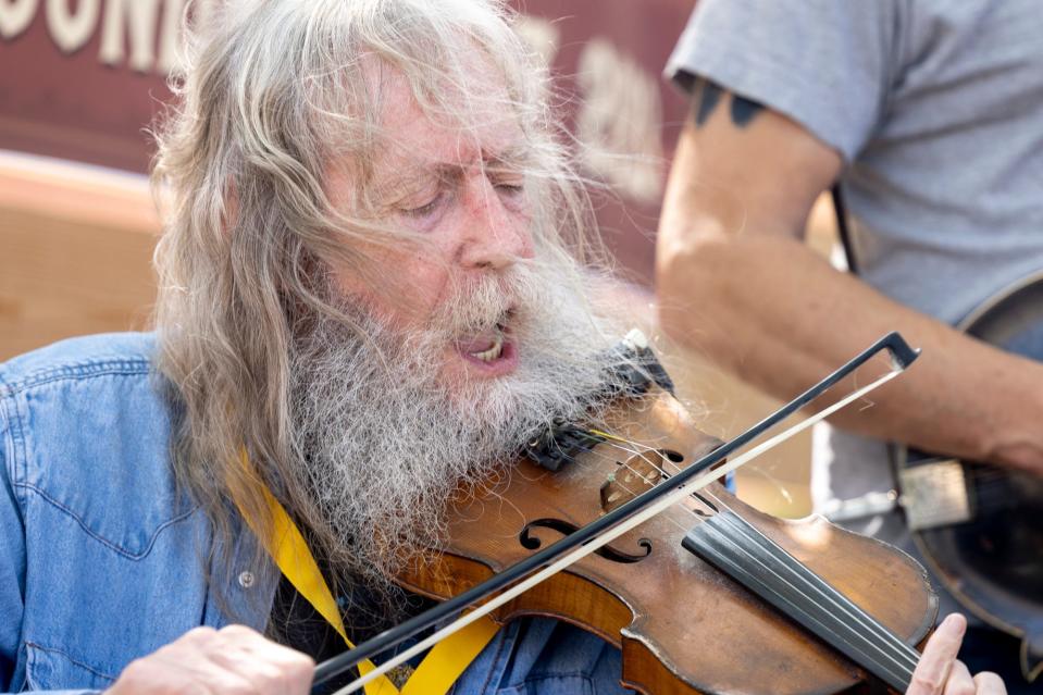 Randy Crouch plays the fiddle at White Buffalo Brunch on the Stonecloud stage at the Bob Childers' Gypsy Cafe in Stillwater, Okla. on Sunday, May 7, 2023.