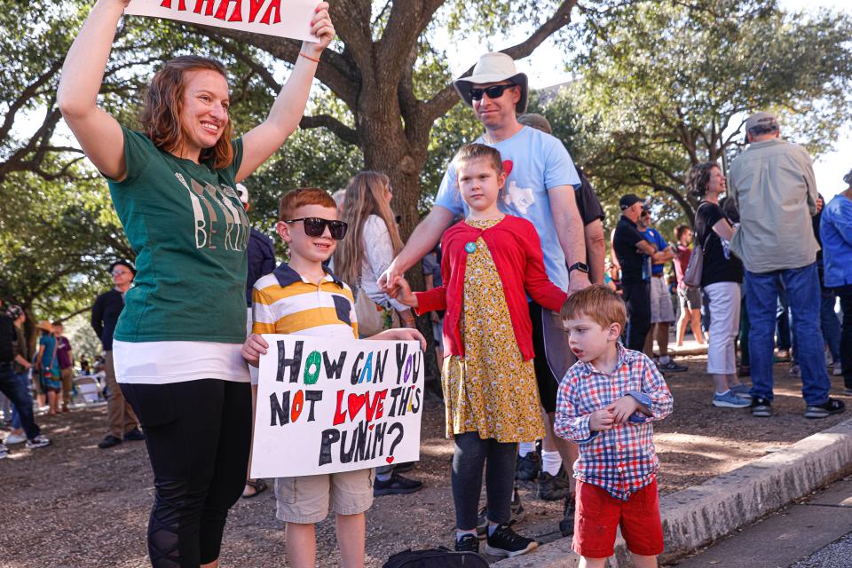 From left, Debbie Cohen, Ethan Cohen, Gabi Cohen, John Cohen and Spencer Cohen make their feelings known at the Rally for Kindness.