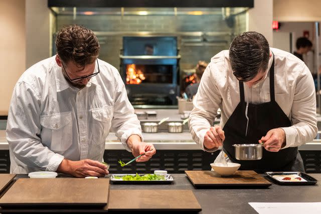 <p>Courtesy of Okta</p> Chefs at work in the Okta kitchen