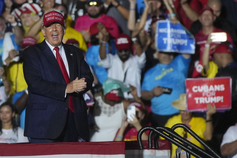 Former President Donald Trump reacts to the crowd after he finished speaking at a campaign rally in support of the campaign of Sen. Marco Rubio, R-Fla., at the Miami-Dade County Fair and Exposition on Sunday, Nov. 6, 2022, in Miami. (AP Photo/Rebecca Blackwell)